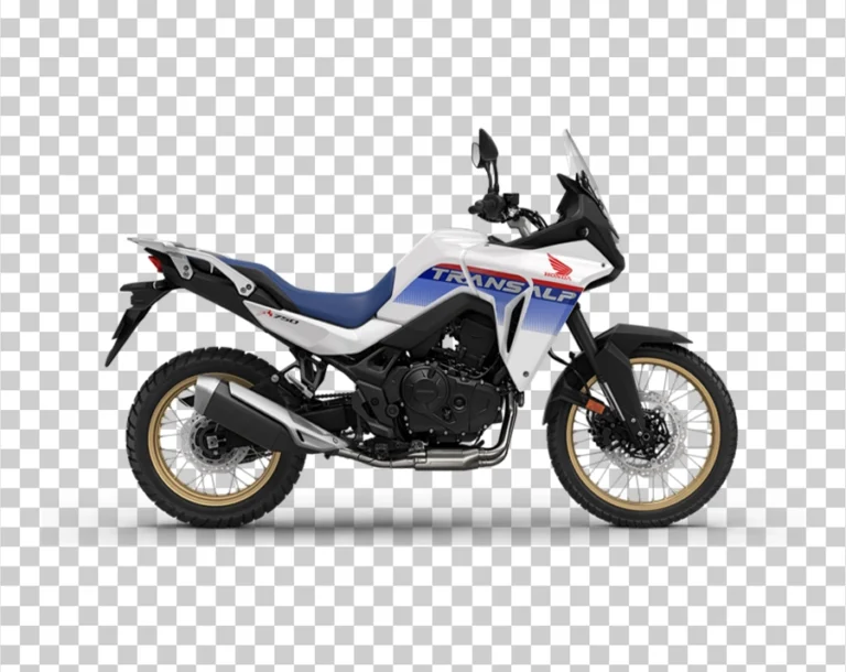 A side view of a white, blue, and red Honda XL750 Transalp adventure motorcycle.
