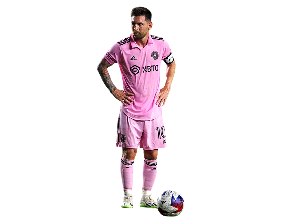 Full body shot of Lionel Messi in the Inter Miami CF pink home kit with a ball at his feet, standing on a transparent background.