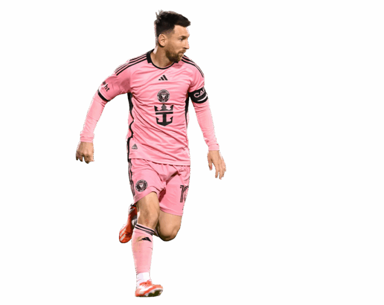 Full-body action shot of Lionel Messi in his long-sleeve Inter Miami pink jersey during a match.